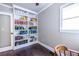 Inviting office with built-in bookshelves filled with books and decor, providing ample storage at 1010 Eden Se Ave, Atlanta, GA 30316