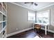 Cozy office featuring a desk with a chair and natural light coming through two windows at 1010 Eden Se Ave, Atlanta, GA 30316