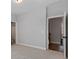 Bedroom showcasing an adjacent bathroom and hallway at 1911 Commons Cir, Brookhaven, GA 30341