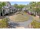 A scenic view of community walkways with attractive homes on either side at 1911 Commons Cir, Brookhaven, GA 30341