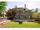 Spacious backyard featuring a stone patio, hot tub and lush greenery at 2141 Abby Ne Ln, Atlanta, GA 30345