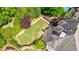 An aerial view of a pristine backyard featuring lush greenery and thoughtful landscaping at 2141 Abby Ne Ln, Atlanta, GA 30345