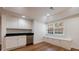 Finished basement bar area with white cabinets, dark countertops, stainless steel appliances, and window at 2141 Abby Ne Ln, Atlanta, GA 30345