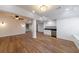 Finished basement with open layout, bar area with cabinetry, coffered ceilings, and wood-look flooring at 2141 Abby Ne Ln, Atlanta, GA 30345