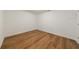 Bright bedroom features sleek hardwood-style flooring, fresh white walls, and modern trim at 2141 Abby Ne Ln, Atlanta, GA 30345