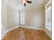 Bright, empty bedroom with hardwood floors, crown molding, and large windows offers a serene, customizable space at 2141 Abby Ne Ln, Atlanta, GA 30345