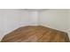 Bright bedroom features sleek hardwood-style flooring, fresh white walls, and modern trim at 2141 Abby Ne Ln, Atlanta, GA 30345