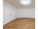 Bright, spacious room featuring pristine white walls and contrasting light brown laminate flooring at 2141 Abby Ne Ln, Atlanta, GA 30345