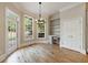 Light-filled breakfast nook with built-in shelves, desk, and backyard access at 2141 Abby Ne Ln, Atlanta, GA 30345