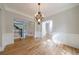 Spacious dining room with hardwood floors and an elegant chandelier at 2141 Abby Ne Ln, Atlanta, GA 30345