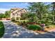 Elegant brick home with mature landscaping, a driveway, and a charming front entrance at 2141 Abby Ne Ln, Atlanta, GA 30345