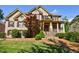 Beautiful two-story brick home with a well-manicured lawn and mature trees at 2141 Abby Ne Ln, Atlanta, GA 30345