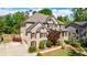 Charming two-story brick home with a manicured front yard and tasteful landscaping at 2141 Abby Ne Ln, Atlanta, GA 30345
