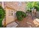 Outdoor view of home showing brick wall and door at 2141 Abby Ne Ln, Atlanta, GA 30345