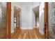 Spacious foyer with hardwood floors and decorative glass double doors at 2141 Abby Ne Ln, Atlanta, GA 30345