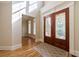 Grand foyer with hardwood floors, natural light, and decorative glass double doors at 2141 Abby Ne Ln, Atlanta, GA 30345