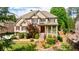 Charming brick home with a landscaped front yard, welcoming entrance and manicured bushes at 2141 Abby Ne Ln, Atlanta, GA 30345
