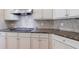Granite countertops and tile backsplash in a modern kitchen at 2141 Abby Ne Ln, Atlanta, GA 30345