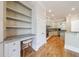 Gourmet kitchen featuring stainless steel appliances, granite countertops, and built-in desk at 2141 Abby Ne Ln, Atlanta, GA 30345