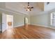 Spacious main bedroom boasts hardwood floors, tray ceilings, and an ensuite bathroom at 2141 Abby Ne Ln, Atlanta, GA 30345