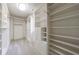 Walk-in closet with custom shelving and ample storage space at 2141 Abby Ne Ln, Atlanta, GA 30345
