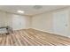 Finished basement rec room area with plank floors at 3229 Summer Stream Nw Ln, Kennesaw, GA 30152