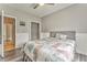 Cozy bedroom with ceiling fan, wainscoting, closet and natural light at 3229 Summer Stream Nw Ln, Kennesaw, GA 30152