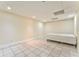 Bedroom with tile floors, neutral walls, drop ceiling with recessed lighting, and plenty of natural light at 3229 Summer Stream Nw Ln, Kennesaw, GA 30152