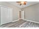 Bedroom with double closet doors at 3229 Summer Stream Nw Ln, Kennesaw, GA 30152