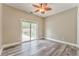 Bedroom with sliding glass doors to backyard at 3229 Summer Stream Nw Ln, Kennesaw, GA 30152