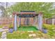 Backyard retreat featuring a charming gazebo, perfect for relaxation, and a cozy fire pit at 3229 Summer Stream Nw Ln, Kennesaw, GA 30152