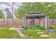 Backyard retreat featuring a charming gazebo, perfect for relaxation, and a cozy fire pit at 3229 Summer Stream Nw Ln, Kennesaw, GA 30152