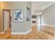 Spacious living room features hardwood floors, a fireplace, and an open layout, perfect for entertaining at 3229 Summer Stream Nw Ln, Kennesaw, GA 30152
