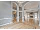 Living room view highlighting an open-concept design with hardwood floors and an airy feel at 3229 Summer Stream Nw Ln, Kennesaw, GA 30152