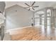 Large living room showcasing hardwood floors, a fireplace, neutral paint, and an open floor plan at 3229 Summer Stream Nw Ln, Kennesaw, GA 30152