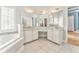 Bright bathroom with soaking tub, double sinks, granite countertops, and recessed lighting at 3229 Summer Stream Nw Ln, Kennesaw, GA 30152