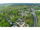 An aerial view shows the location of the property within a wooded neighborhood near the main road at 4270 Parnell Rd, Marietta, GA 30062