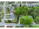 A neighborhood aerial view shows mature tree coverage and well-manicured lawns at 4270 Parnell Rd, Marietta, GA 30062