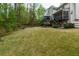Expansive backyard featuring lush green grass and a spacious deck, perfect for outdoor entertaining at 4270 Parnell Rd, Marietta, GA 30062