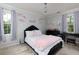 Charming bedroom with large windows, stylish decor, and comfortable furnishings, creating a serene and inviting space at 4270 Parnell Rd, Marietta, GA 30062