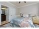 Cozy bedroom with ceiling fan, ensuite bathroom, and neutral color palette at 4270 Parnell Rd, Marietta, GA 30062