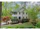 Charming two-story home with landscaped yard and mature trees for privacy at 4270 Parnell Rd, Marietta, GA 30062