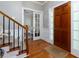 Welcoming foyer with hardwood floors, staircase, and view into another room at 4270 Parnell Rd, Marietta, GA 30062