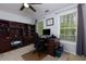 Bright home office space with large built-in bookcase, neutral colors, and dual windows at 4270 Parnell Rd, Marietta, GA 30062