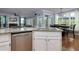 Open-concept kitchen featuring stainless steel appliances, granite countertops, and a view into the dining and living areas at 4270 Parnell Rd, Marietta, GA 30062