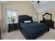 Spacious main bedroom featuring high ceilings and a decorative furniture set at 4270 Parnell Rd, Marietta, GA 30062