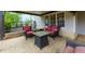Inviting covered patio with ample seating and a cozy fire pit, perfect for relaxing and entertaining year-round at 4270 Parnell Rd, Marietta, GA 30062