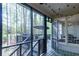 Relaxing screened porch with string lights and wooded views, perfect for outdoor dining and entertaining at 4270 Parnell Rd, Marietta, GA 30062