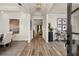 Elegant foyer featuring hardwood floors, stylish furnishings, and modern decor at 559 Southland Cir, Canton, GA 30115