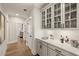 Hallway with display cabinets and elegant countertop providing both functionality and aesthetic appeal at 559 Southland Cir, Canton, GA 30115